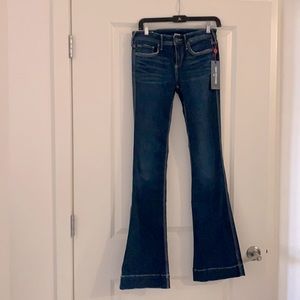 True Religion dark wash Nikki mid rise flare.